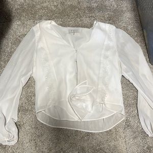 Women’s size M white top.